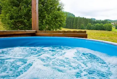 Piscine de l'établissement Chalet spacieux à Le Tholy avec vue montagne ou située à proximité
