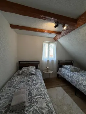 Un ou plusieurs lits dans un hébergement de l'établissement LE 16 - Très bel Appartement 3 chambres rénové pour 8 personnes