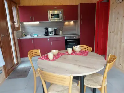 Cuisine ou kitchenette dans l'établissement Chalet in St Maurice near Ballon d'Alsace