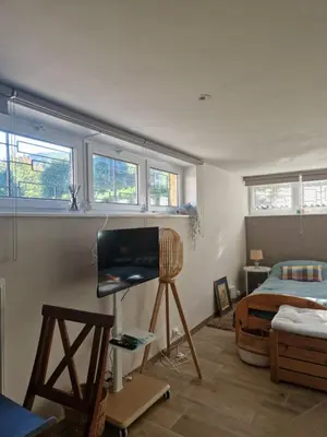 Télévision ou salle de divertissement dans l'établissement Jeanmyr