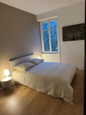 Un ou plusieurs lits dans un hébergement de l'établissement Apartment de standing