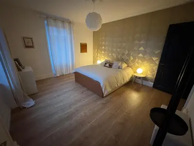 Un ou plusieurs lits dans un hébergement de l'établissement Apartment de standing