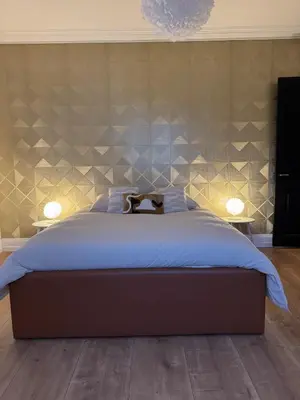 Un ou plusieurs lits dans un hébergement de l'établissement Apartment de standing