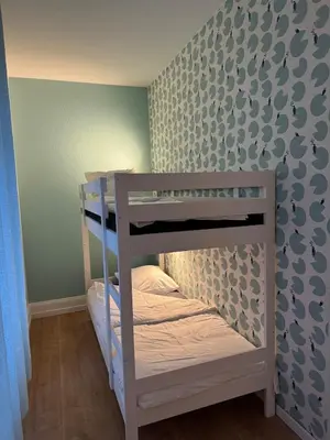 Un ou plusieurs lits dans un hébergement de l'établissement Apartment de standing