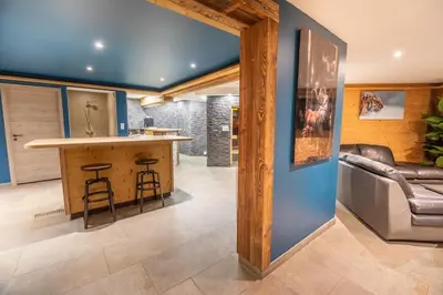 Cuisine ou kitchenette dans l'établissement Chalet Horizon 200 m2 Jacuzzi et Sauna