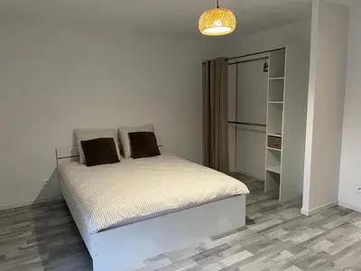 Un ou plusieurs lits dans un hébergement de l'établissement Maison cosy 6 pers Proche Europa-Park