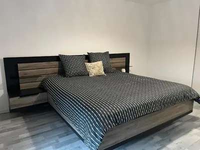 Un ou plusieurs lits dans un hébergement de l'établissement Maison cosy 6 pers Proche Europa-Park