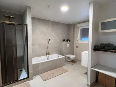 Salle de bains dans l'établissement Maison cosy 6 pers Proche Europa-Park