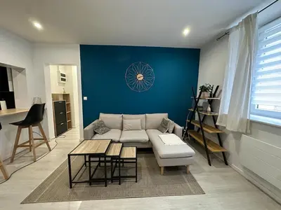 Coin salon dans l'établissement Appartement moderne et cosy - Le Refuge du Bonhomme