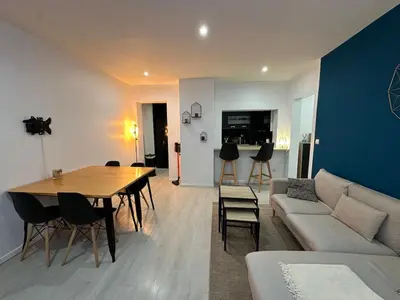 Coin salon dans l'établissement Appartement moderne et cosy - Le Refuge du Bonhomme