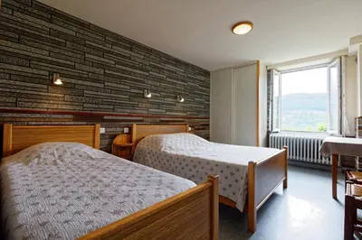 Un ou plusieurs lits dans un hébergement de l'établissement Gîte Edelweiss