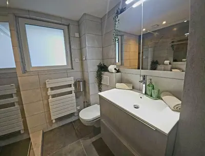 Salle de bains dans l'établissement Appartement Familial- T3 LUXE- Borne VE- Recharging Station - 5min de la Gare- Colmar