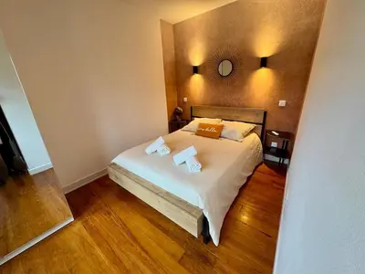 Un ou plusieurs lits dans un hébergement de l'établissement LE GRENAT Appartement Cosy - Route des Vins - Proche Colmar