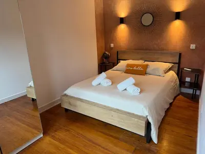 Un ou plusieurs lits dans un hébergement de l'établissement LE GRENAT Appartement Cosy - Route des Vins - Proche Colmar