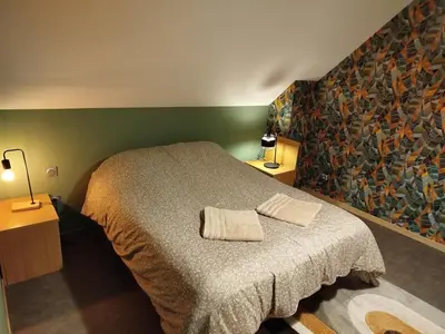 Un ou plusieurs lits dans un hébergement de l'établissement Small atypical house, in central Alsace