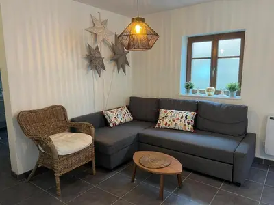 Coin salon dans l'établissement Sand & Chill - Appartement 55R