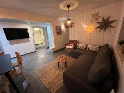 Télévision ou salle de divertissement dans l'établissement Sand & Chill - Appartement 55R