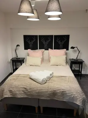 Un ou plusieurs lits dans un hébergement de l'établissement Sand & Chill - Appartement 55R