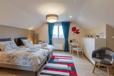 Un ou plusieurs lits dans un hébergement de l'établissement Chambre Rambouillet, Au Domaine du Cerf
