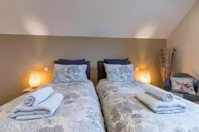 Un ou plusieurs lits dans un hébergement de l'établissement Chambre Rambouillet, Au Domaine du Cerf