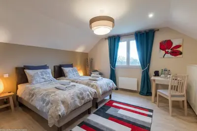 Un ou plusieurs lits dans un hébergement de l'établissement Chambre Rambouillet, Au Domaine du Cerf