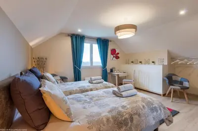 Un ou plusieurs lits dans un hébergement de l'établissement Chambre Rambouillet, Au Domaine du Cerf