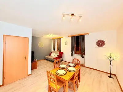 Coin salon dans l'établissement Le Charmant Refuge au Cœur de Rouffach