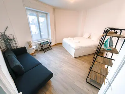 Un ou plusieurs lits dans un hébergement de l'établissement Appartement Hyper Centre Moderne - French Luxury