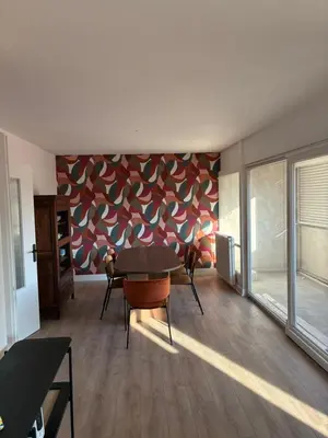 Coin salon dans l'établissement Appartement Porte Jeune - 3 Chambres Balcon Fibre Netflix