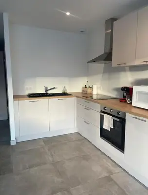 Cuisine ou kitchenette dans l'établissement Logement indépendant calme confort détente et convivialité
