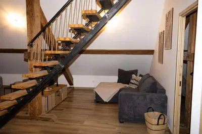 Coin salon dans l'établissement Loft La Sous Préf!