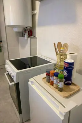 Cuisine ou kitchenette dans l'établissement L'échappée Colmarienne - Cosy et moderne