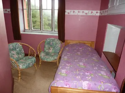 Un ou plusieurs lits dans un hébergement de l'établissement Holiday Home Vagney near Ski Gérardmer