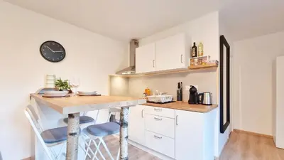 Cuisine ou kitchenette dans l'établissement Les Bouleaux d'Alsace - Parking