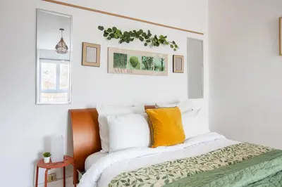 Un ou plusieurs lits dans un hébergement de l'établissement VOX - Spacieux et lumineux - Balcon ascenseur - Centre ville