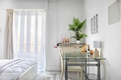 Un ou plusieurs lits dans un hébergement de l'établissement VOX - Spacieux et lumineux - Balcon ascenseur - Centre ville