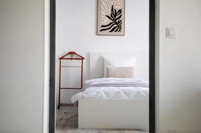 Un ou plusieurs lits dans un hébergement de l'établissement VOX - Spacieux et lumineux - Balcon ascenseur - Centre ville