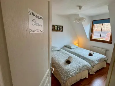 Un ou plusieurs lits dans un hébergement de l'établissement Spacieux appartement calme au coeur de Rouffach