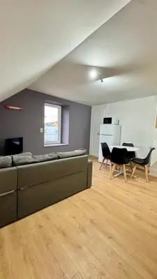 Coin salon dans l'établissement Cosy 7 - Belfort centre