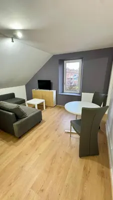 Coin salon dans l'établissement Cosy 6 - Belfort centre