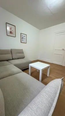 Coin salon dans l'établissement Cosy 5 - Belfort centre
