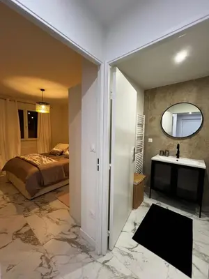 Un ou plusieurs lits dans un hébergement de l'établissement Appartement spacieux centre Colmar