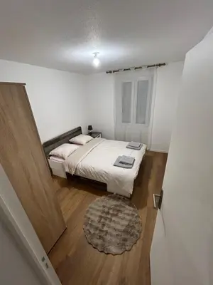 Un ou plusieurs lits dans un hébergement de l'établissement Renove Comfortable Appartement Mulhouse