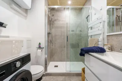 Salle de bains dans l'établissement Lodge Belle Hutte - Proche des Pistes