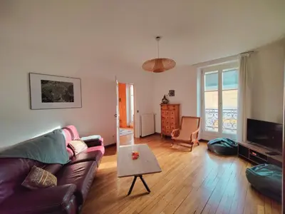 Télévision ou salle de divertissement dans l'établissement Les Capucins - Élégance au Cœur de Remiremont