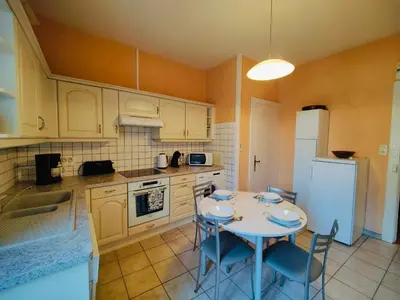 Cuisine ou kitchenette dans l'établissement Les Capucins - Élégance au Cœur de Remiremont