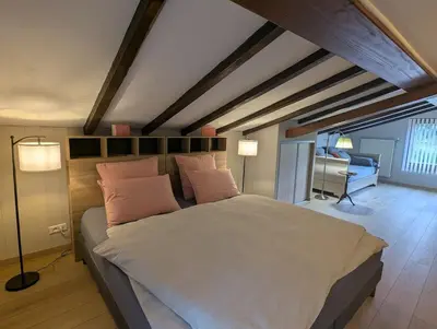 Un ou plusieurs lits dans un hébergement de l'établissement Chambre LA ZIMETTE, Le Balcon de la Zimette