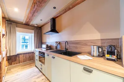 Cuisine ou kitchenette dans l'établissement Appartement Obertor - A quelques minutes de Colmar