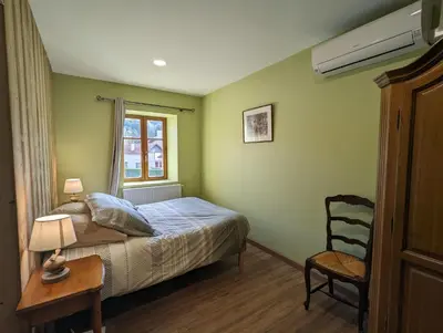Un ou plusieurs lits dans un hébergement de l'établissement Chambre familiale, Les Brimbelles