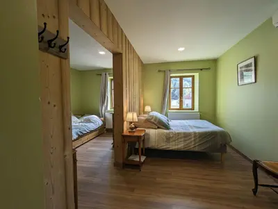 Un ou plusieurs lits dans un hébergement de l'établissement Chambre familiale, Les Brimbelles